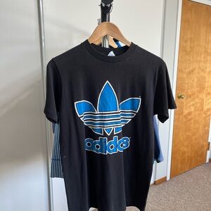 Vintage Adidas Black Tee with Blue Trefoil Logo